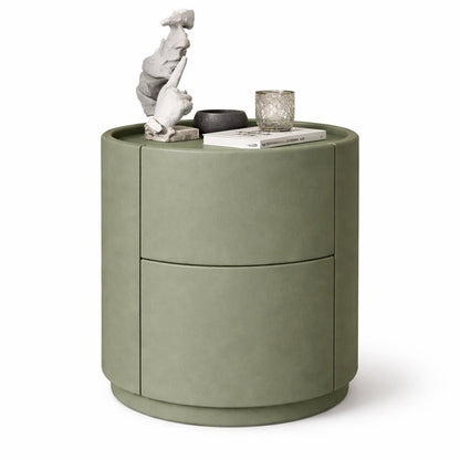 Green side table with decorative items on a white background