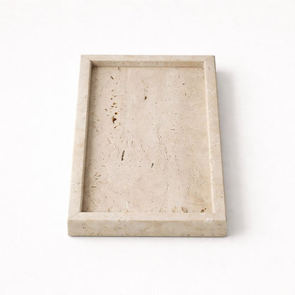 Beige rectangular stone tray on a white background