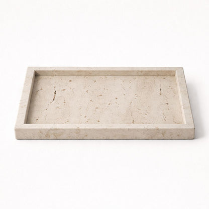 Beige stone tray on a white background