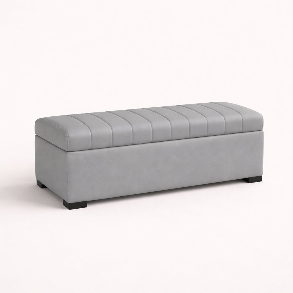 Gray upholstered storage bench on a white background