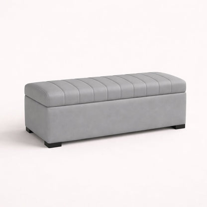 Gray upholstered storage bench on a white background